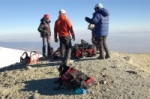 Climbers & gear on summit.