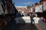 Will on bench at market in Puebla.