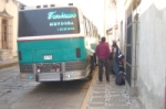 Loading up bus for trip to airport.